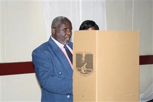 A Blind man from northern region of Malawi in a mock election.