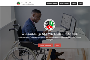 Screenshot of the website of the National Council for Persons with Disability. A man in suit seating in his wheelchair in front of two monitors is used as a background overlayed by text Welcome to NCPWD CAREER PORTAL. Buttons of Register as job seeker and Login follows below.