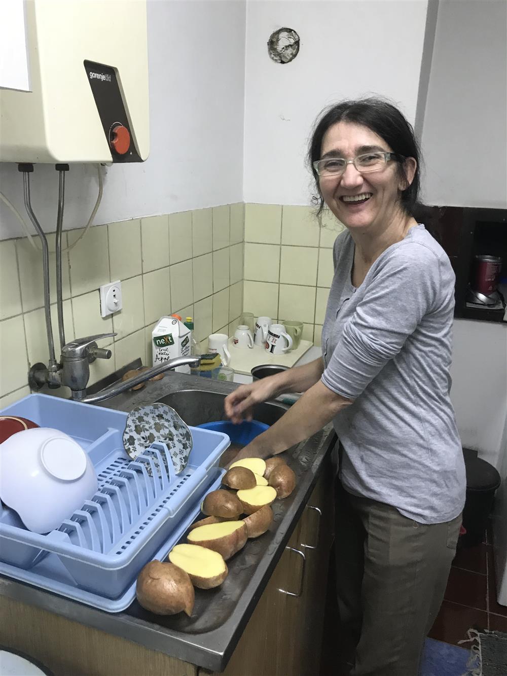 "Jovan works as a baker and lives in a shared apartment after years in an institutions.
Dragica preparing dinner in her shared apartment after years in an institution."